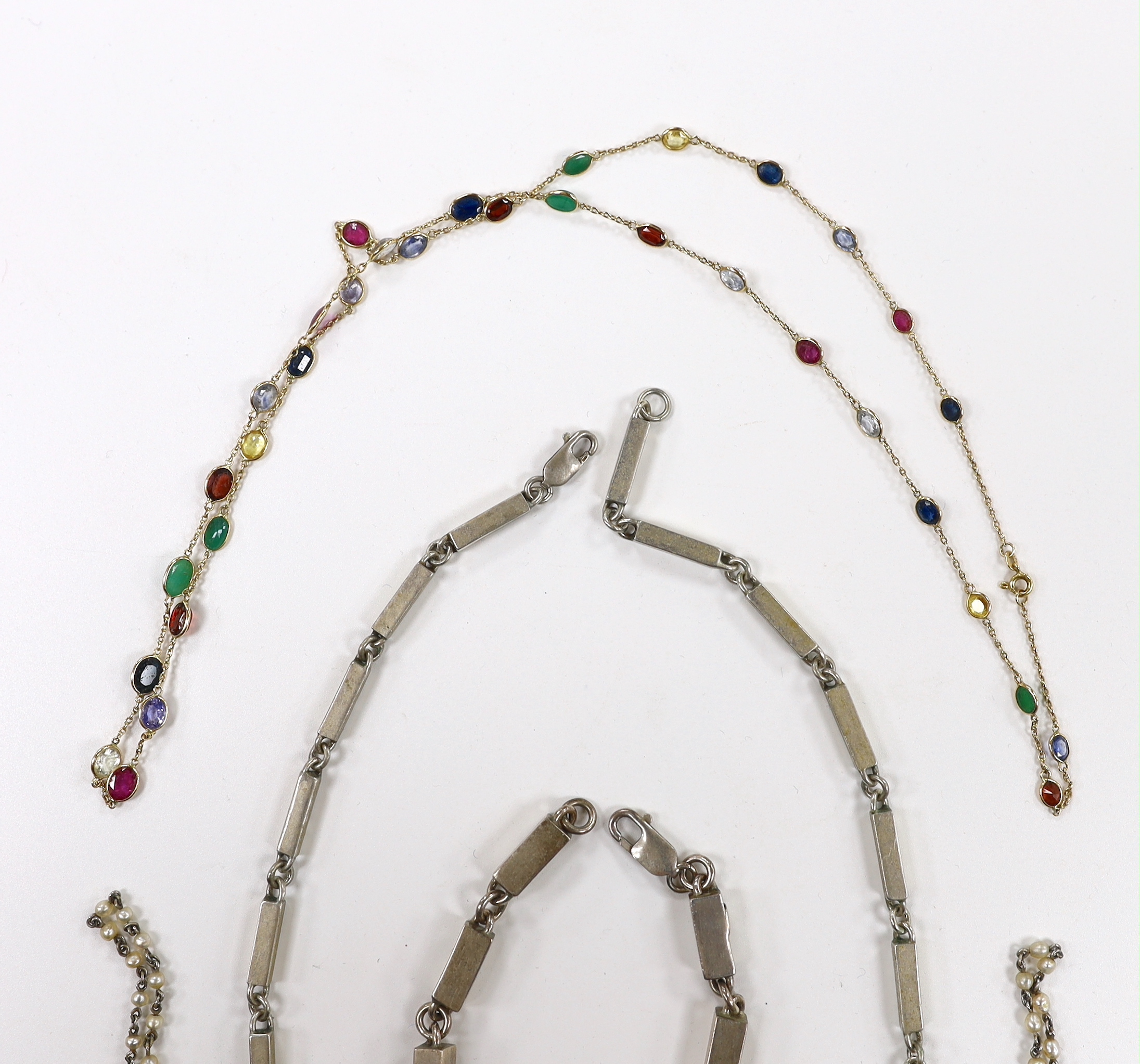 A 585 yellow metal and multi gem set spectacle necklace, 65cm, gross weight 7.9 grams, a 925 box link bracelet and bracelet and a ‘seed pearl’ chain